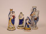 three figurines of the nativity of jesus, mary, and joseph