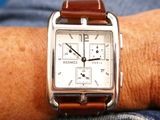 a close up of a watch on a person ' s wrist