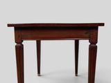 an image of a small table with a wooden top and legs