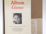 an image of a book with a picture of a man smoking a cigarette in front of a box
