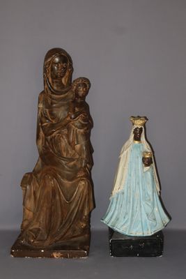 statue of a woman holding a child and a statue of a woman holding a baby