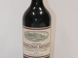 a bottle of wine that is sitting on a table