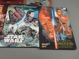 a lot of star wars books on the table