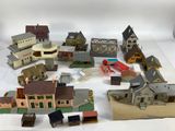 beaucoup de petites maquettes de bâtiments sur la table