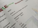 a close up of a receipt with a picture on it