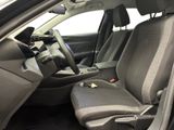 the interior of a car with the front seats folded down