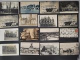 many old photographs of people and buildings on the wall