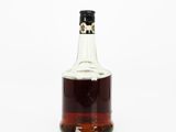 an image of a bottle of liquor on a white background