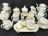 many different types of tea and coffee cups and saucers