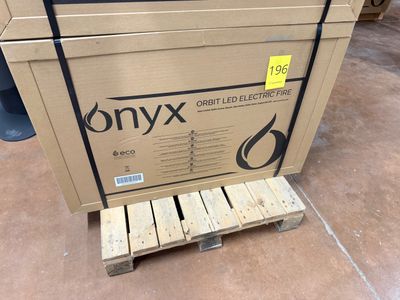 two boxes of onyxx on a pallet in a warehouse