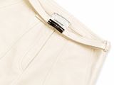 a close up of a pair of white pants on a white surface