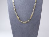 a gold chain necklace on a mannequin mannequin mannequin mannequin mannequin mannequin mannequin mannequin manne
