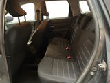 the back seats of a car are empty and the passenger seat is empty