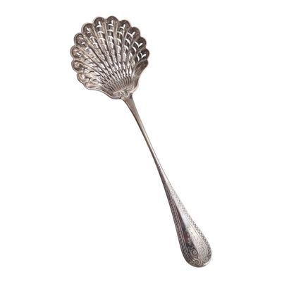 silver plated serving spoon with scallop shaped handle