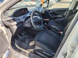 the interior of a car with the door open and a steering wheel in it