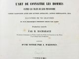 un vieux livre avec un titre en noir et blanc