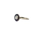 an image of a diamond and sapphire ring on a white background