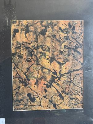 tableau représentant une composition abstraite aux tons noirs et dorés sur fond noir