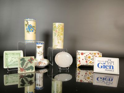many different types of soaps and soap bars on a table