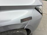 a sticker on the front of a car that has a sticker on it