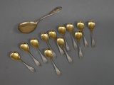 a lot of spoons that are sitting on a table