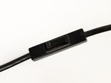 a close up of a black cable with a white background
