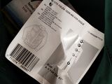 a green jacket that has a barcode on it