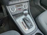 a close up of a car ' s interior with a gear stick