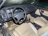 a car with a steering wheel and a dash board