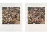 an aerial view of a city with a lot of buildings
