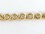 an image of a gold bracelet with diamonds on a white background
