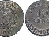 a close up of a coin on a white background