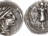 a silver coin with an image of a woman on it