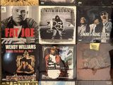 a lot of music cds on the wall in the room