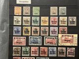 an image of a collection of stamps on display in a case