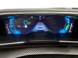 the dashboard of a car with a digital display on it