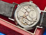 a watch that is sitting in a box on a table