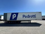 a semi truck that is parked in a parking lot