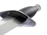 a close up of a knife with a black handle