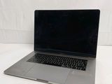 an apple macbook pro laptop computer sitting on top of a white surface