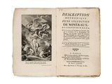 un vieux livre sur lequel figurent un ange et un démon