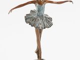 bronze statue of a woman in a tutu on a black base