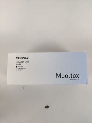 a white box with a label on it sitting on top of a table