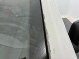 a close up view of a broken windshield on a car