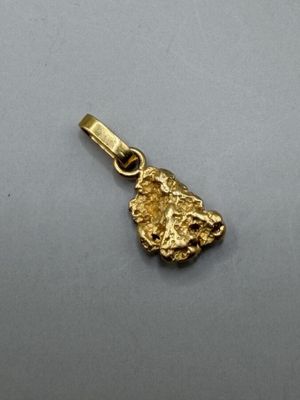 Pendentif pépite en or jaune 750 millièmes 1,3 g. - Photo 1