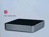 an apple tv box with the box open on a table