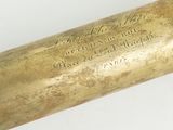 an old brass telescope on a white surface with a white background
