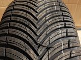 a close up of a tire on a box with a cardboard box in the background