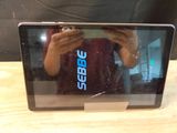 a person taking a picture of themselves in the mirror of a laptop