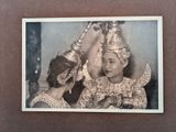 a picture of a woman in a costume and a man in a costume